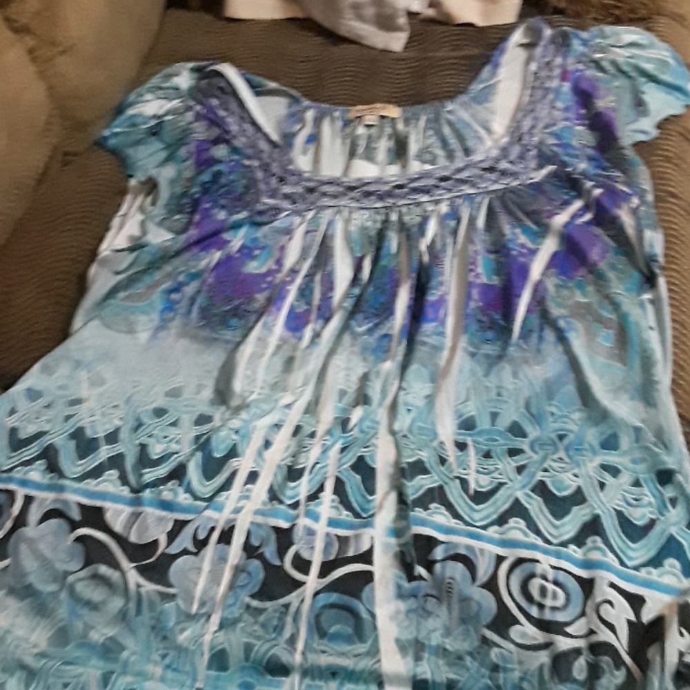 A oneworlds blouse
